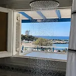 Casa de Férias Stelios' Beachfront Retreat